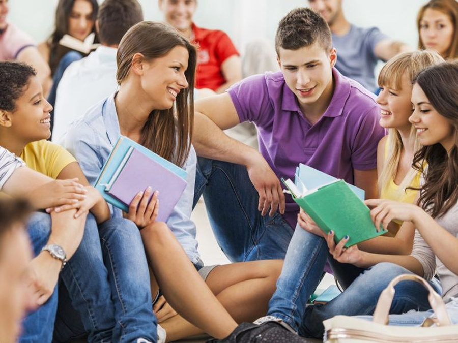 Students discussing coursework together
