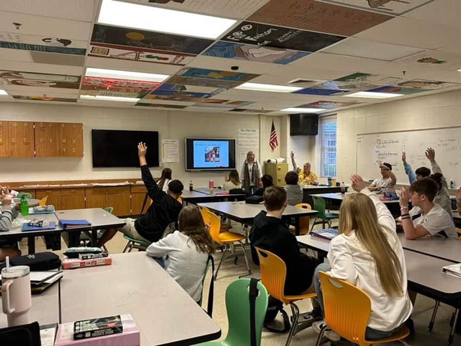 Students participating in a classroom lesson